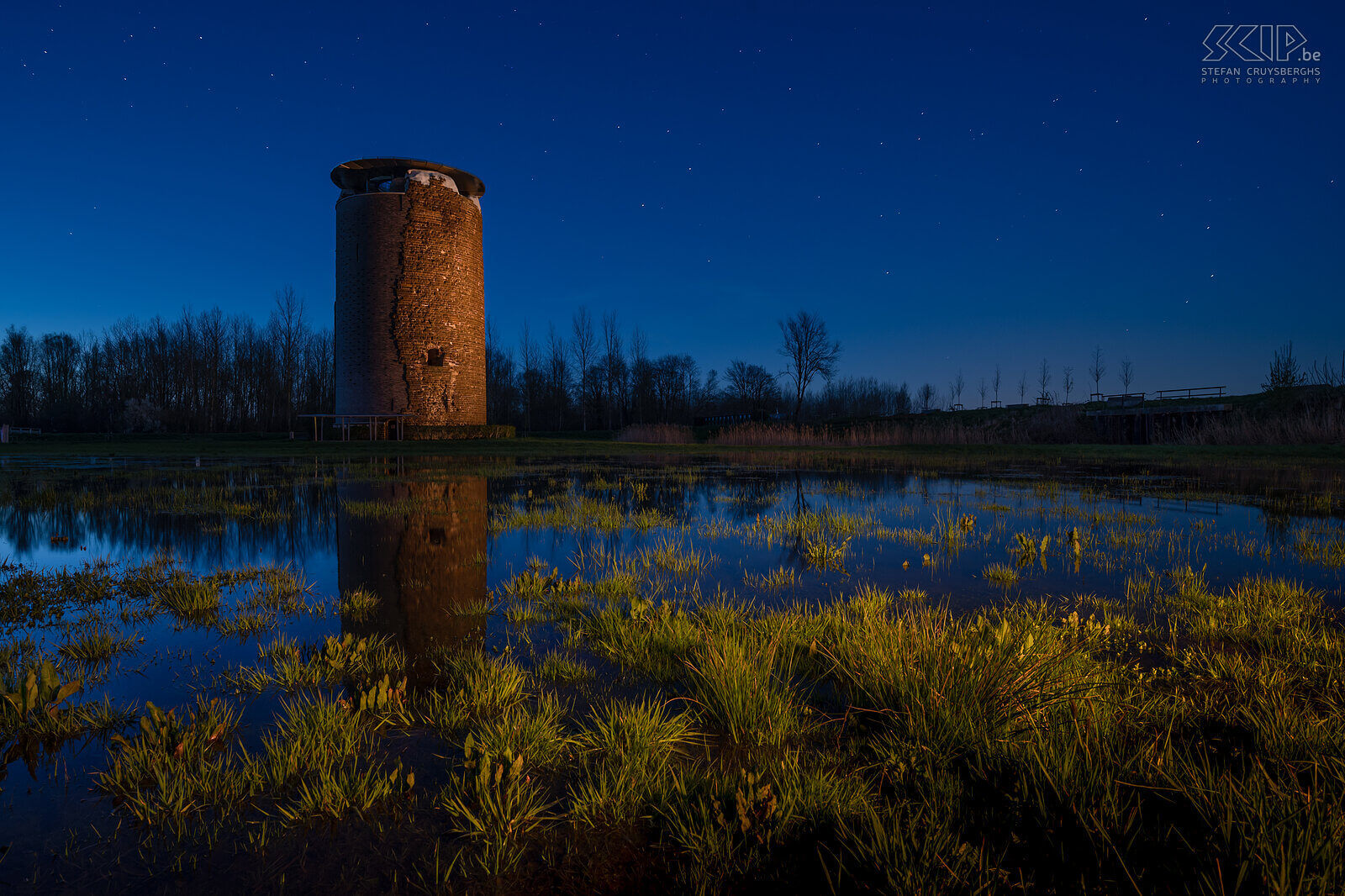 Hageland by night - Maiden's tower in Zichem Blue hour at the Maiden's Tower in my hometown Scherpenheuvel-Zichem. I did some light painting to enlighten the foreground and tower. This tower was built in the 14th century and is located near the Demer river. <br />
 Stefan Cruysberghs